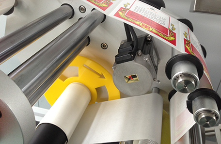 米袋平面貼標(biāo)機